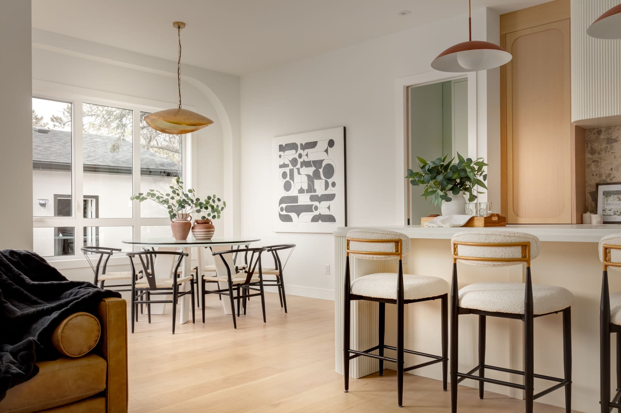 Dining and kitchen overview in the Bowness project by Platinum Build Homes in Bowness, Calgary.
