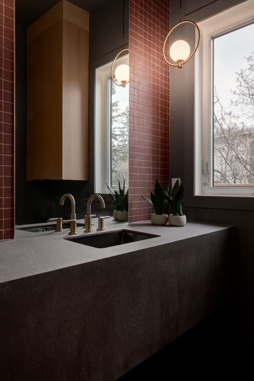 Powder room vanity in the Bowness project by Platinum Build Homes in Bowness, Calgary.