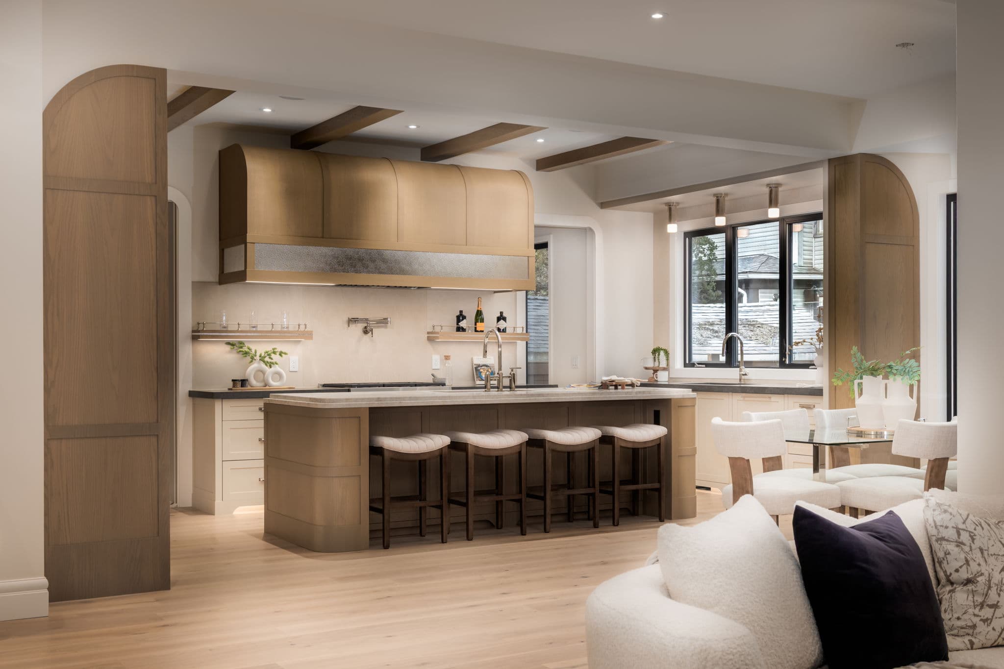 Kitchen and open living area in the Elbow Park project by Platinum Build Homes in Elbow Park, Calgary.