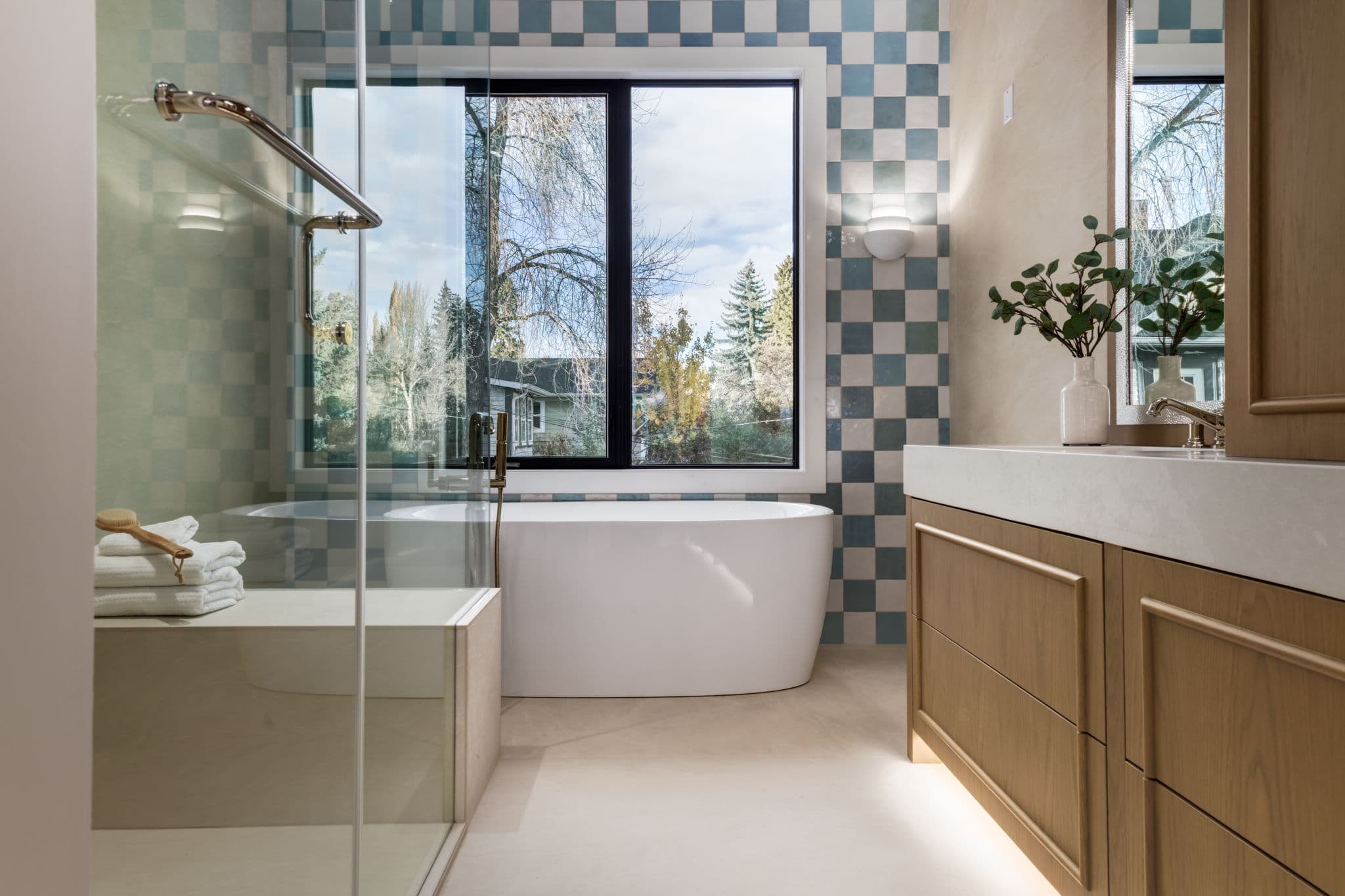 Primary ensuite wide shot in the Elbow Park project by Platinum Build Homes in Elbow Park, Calgary.