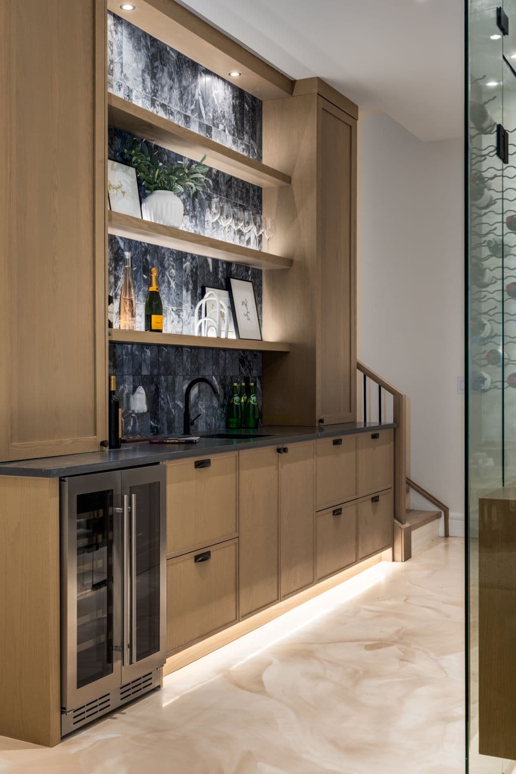 Built-in bar and display cabinetry in the Elbow Park project by Platinum Build Homes in Elbow Park, Calgary.