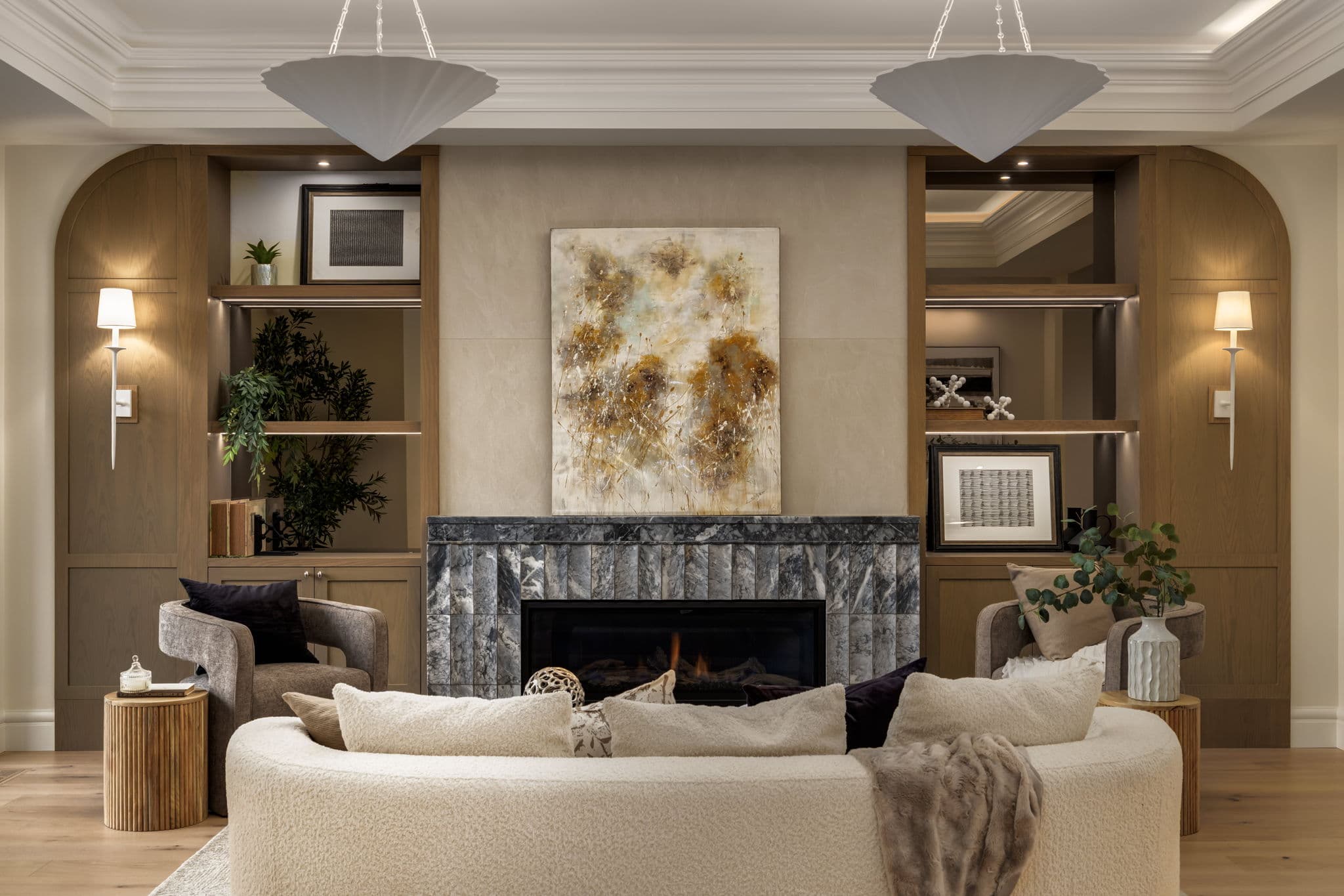 Great room fireplace and custom built-ins in the Elbow Park project by Platinum Build Homes in Elbow Park, Calgary.