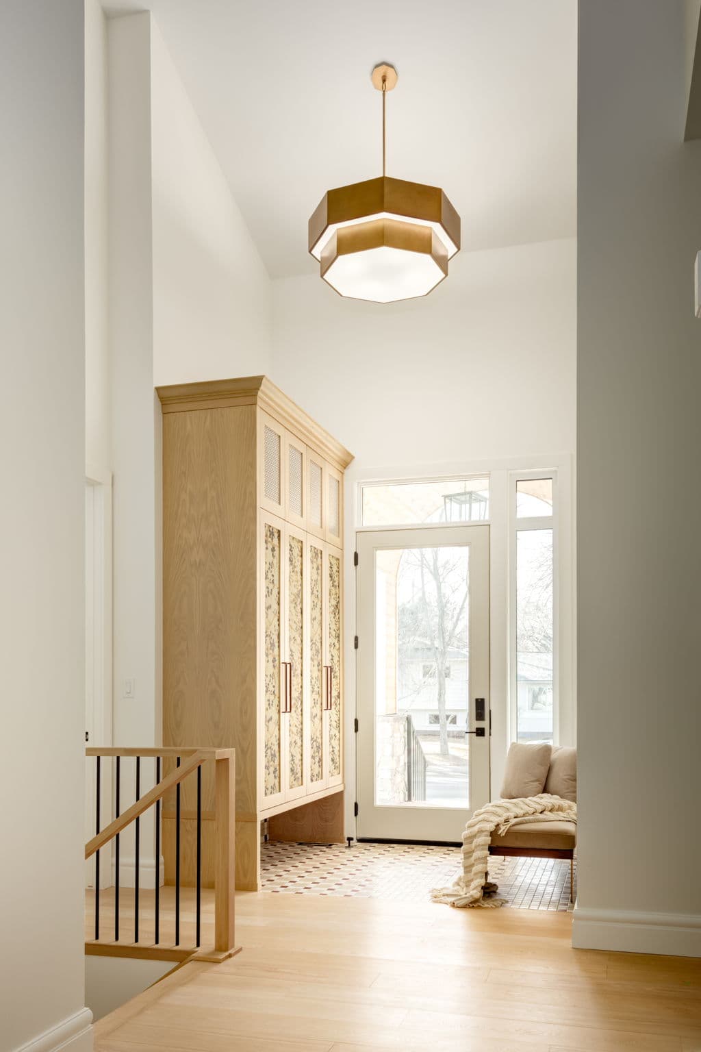 Foyer and stair hall in the Lakeview 1 project by Platinum Build Homes in Lakeview, Calgary.