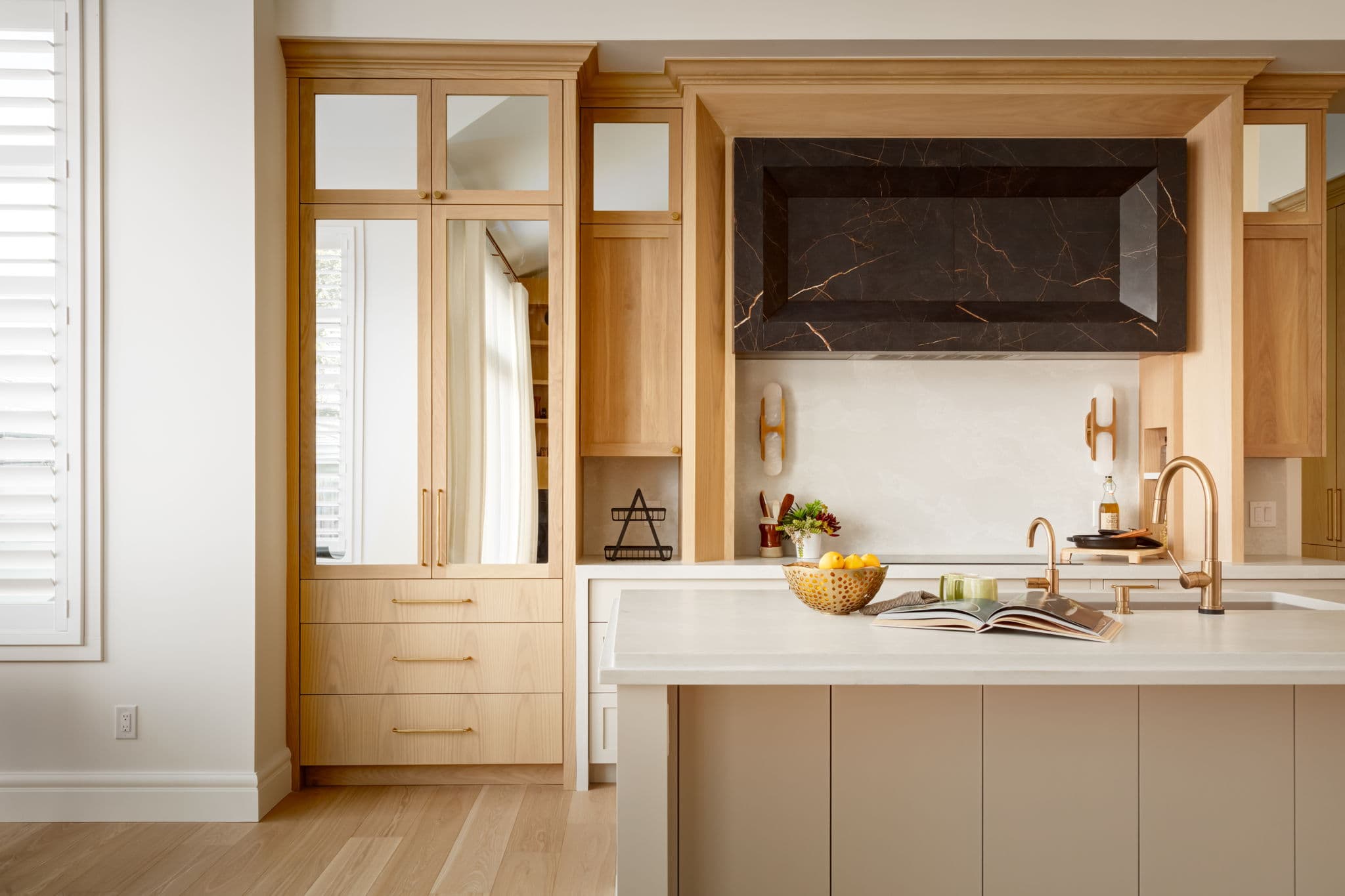 Kitchen millwork and range wall in the Lakeview 1 project by Platinum Build Homes in Lakeview, Calgary.