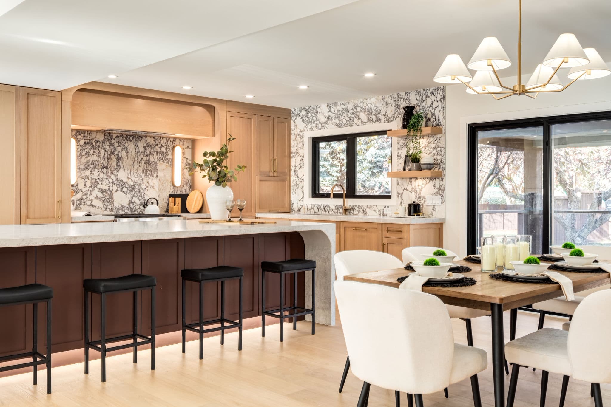Kitchen and dining area in the Varsity 1 project by Platinum Build Homes in Varsity, Calgary.