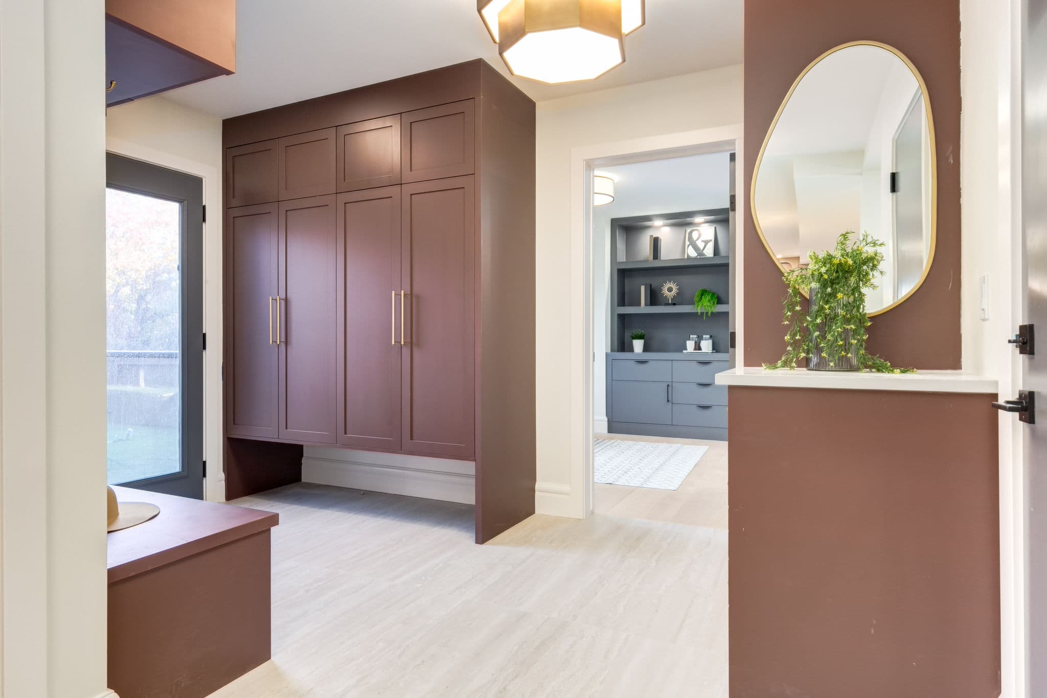Entry and built-in cabinetry detail in the Varsity 1 project by Platinum Build Homes in Varsity, Calgary.