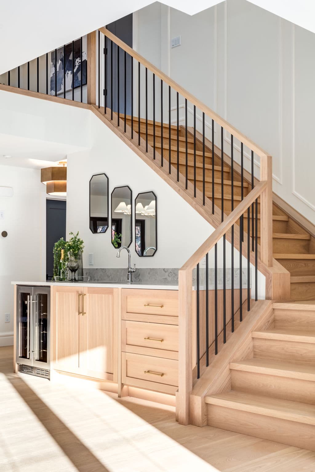 Stair and vanity detail in the Varsity 1 project by Platinum Build Homes in Varsity, Calgary.