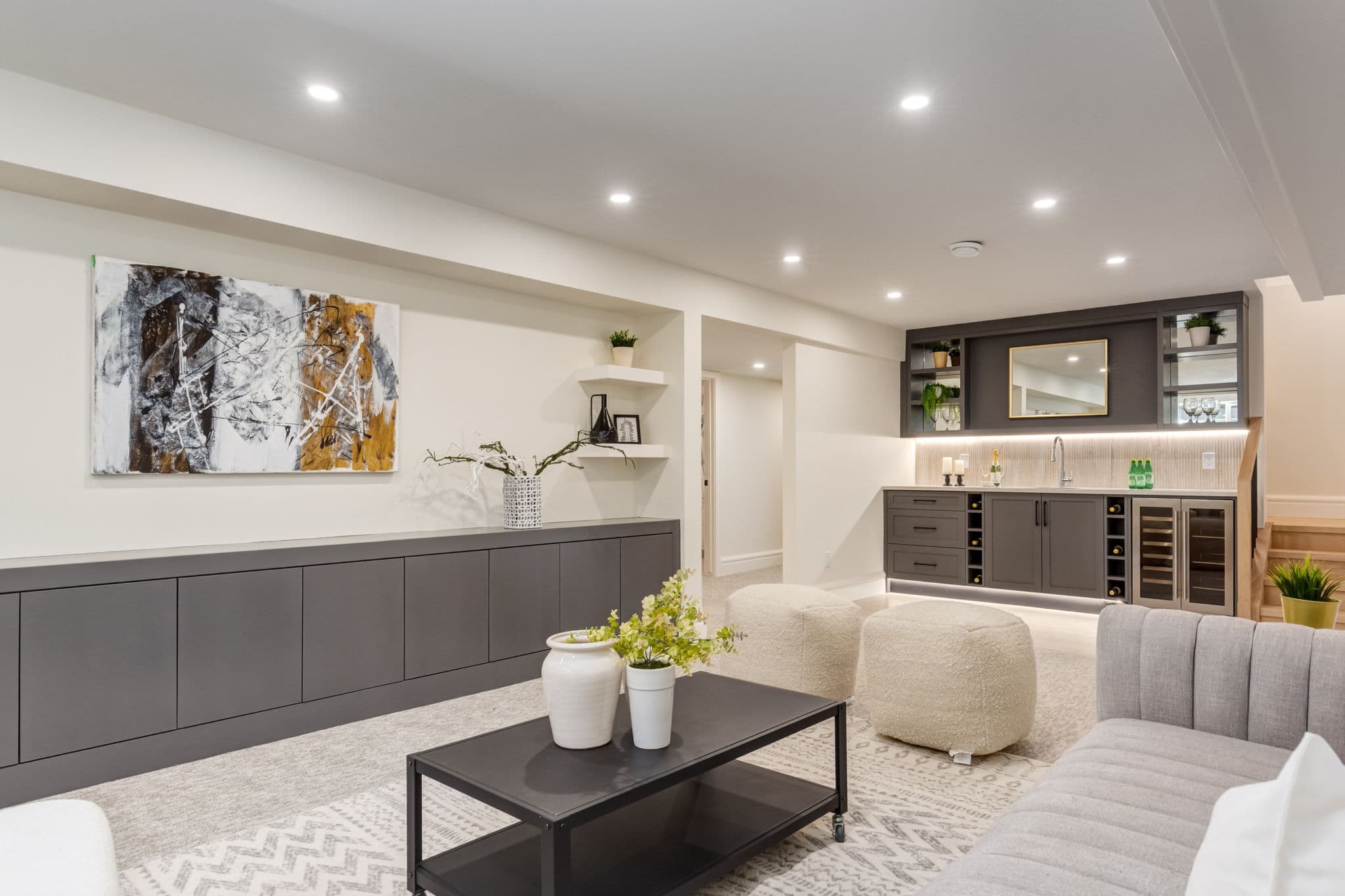 Basement lounge area in the Varsity 1 project by Platinum Build Homes in Varsity, Calgary.