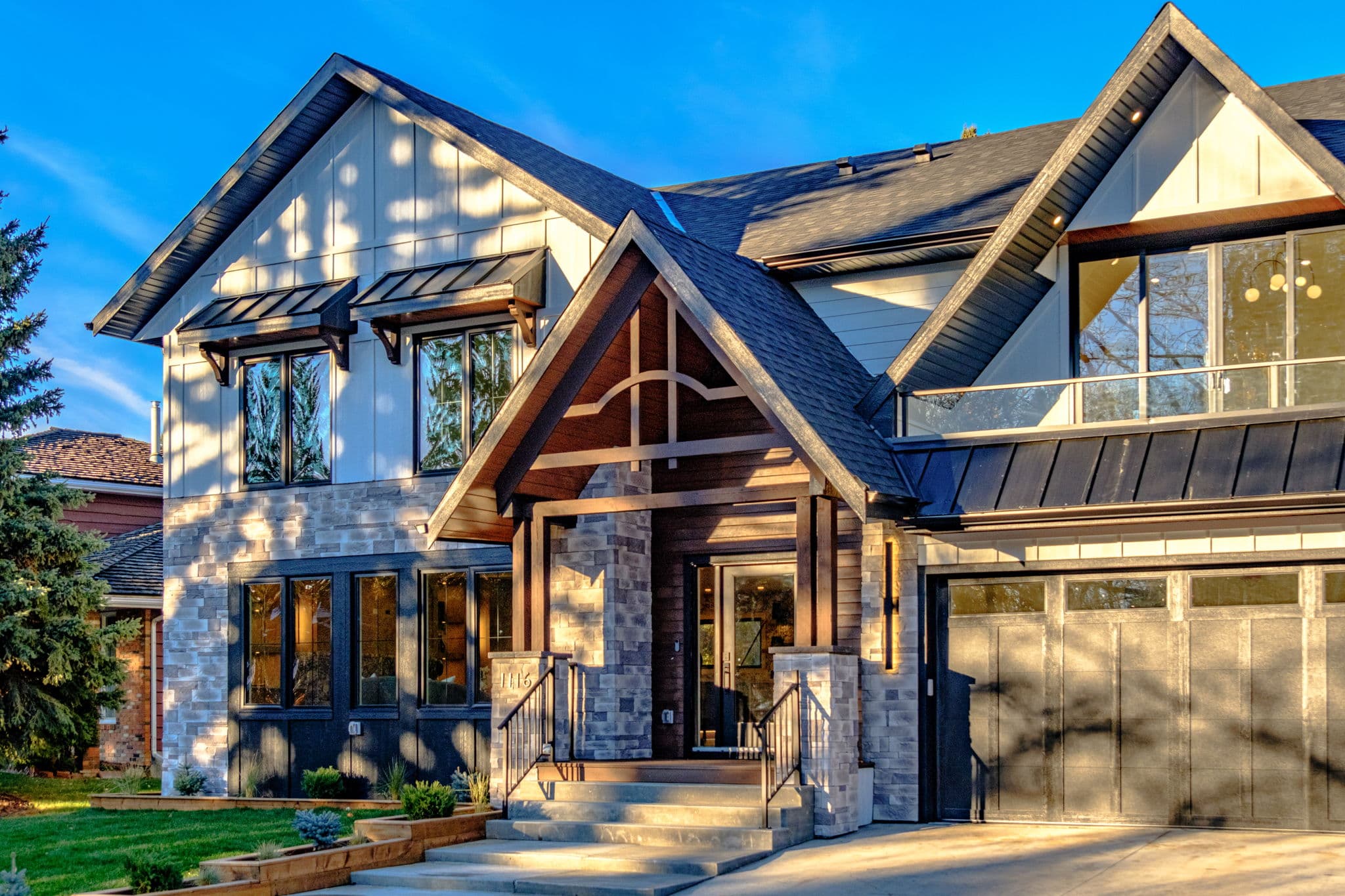 Front exterior of renovated Varsity home in the Varsity 1 project by Platinum Build Homes in Varsity, Calgary.