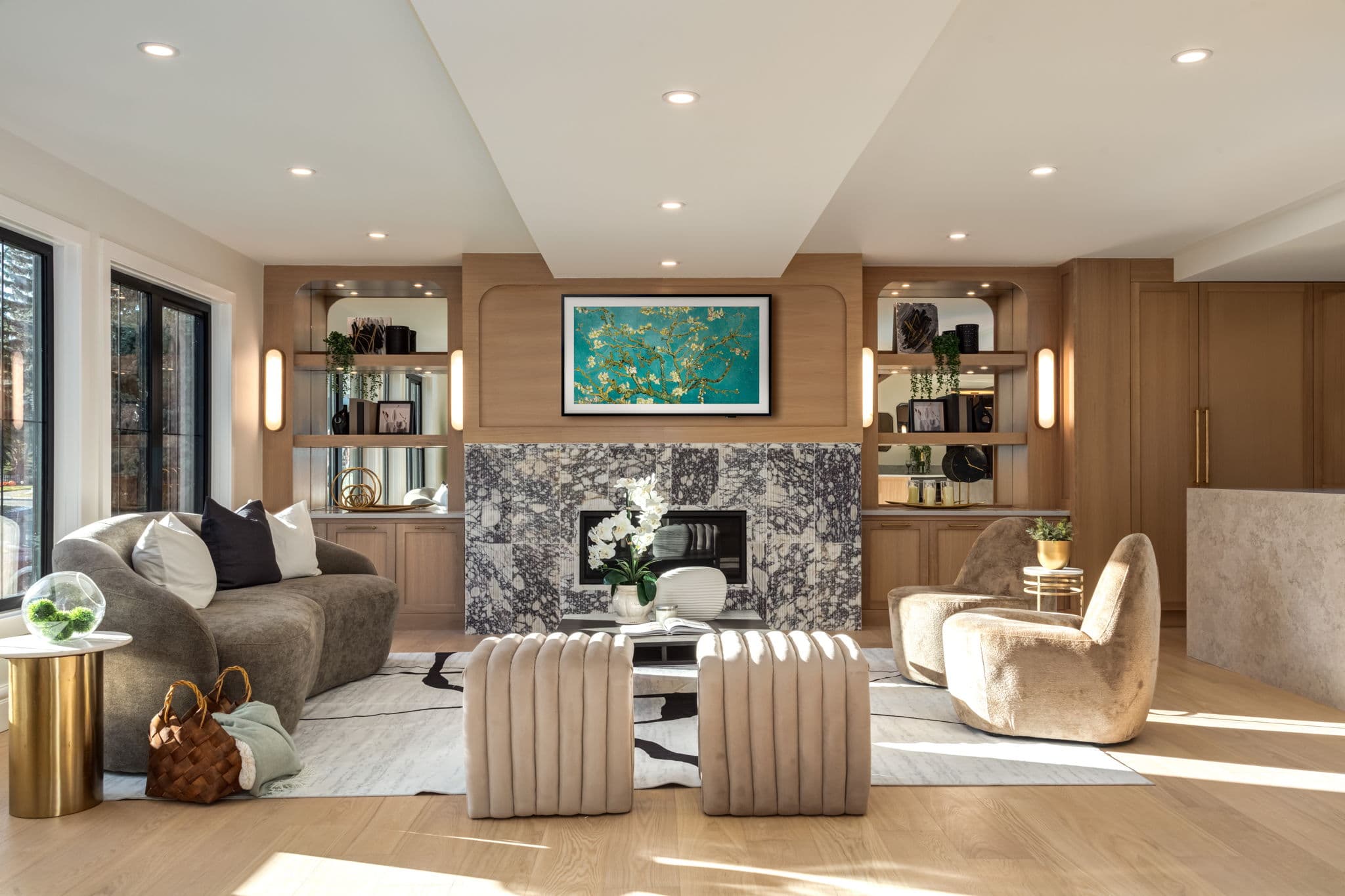 Living room fireplace and built-ins in the Varsity 1 project by Platinum Build Homes in Varsity, Calgary.