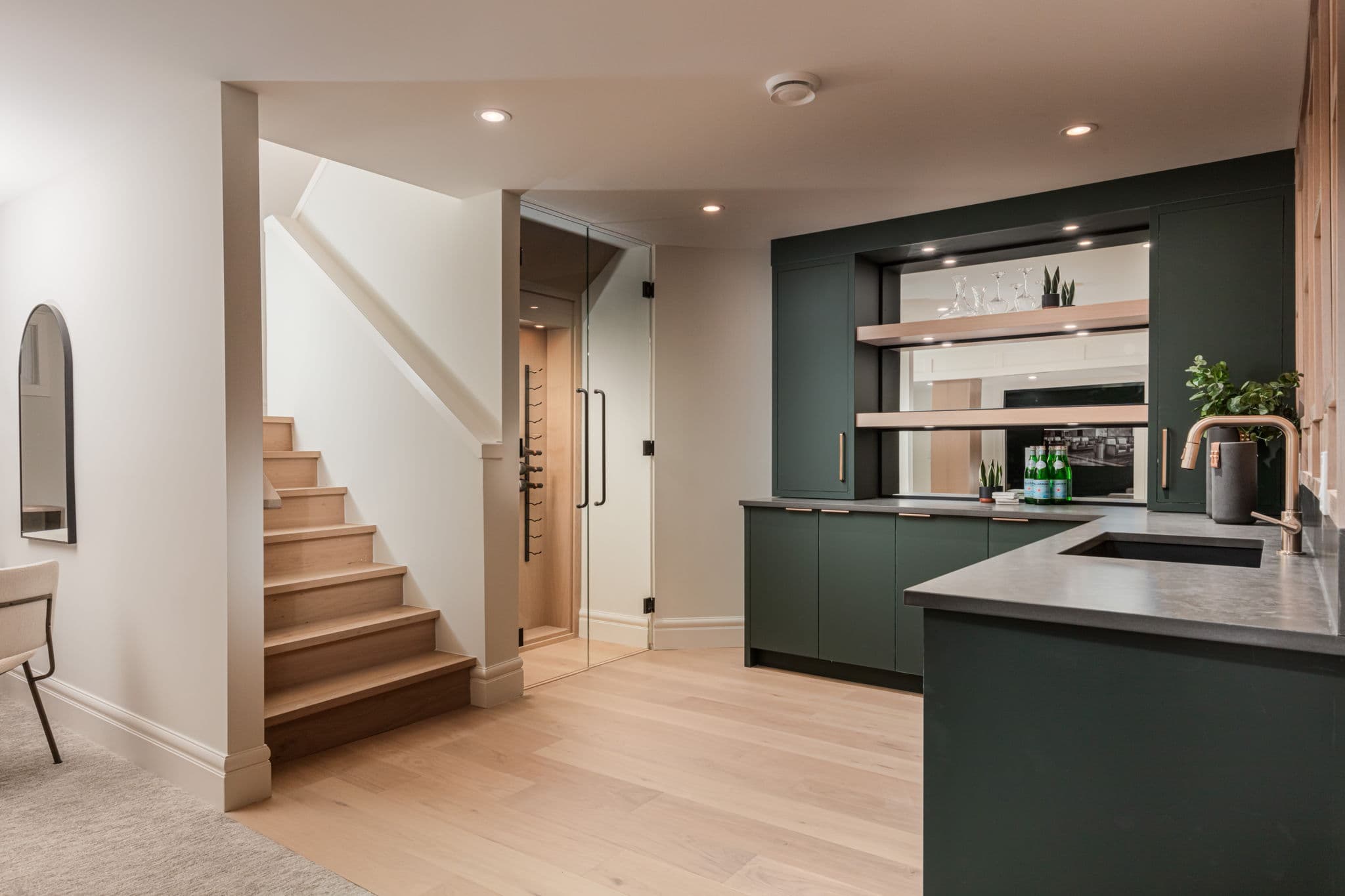 Kitchen and stair overview in the Varsity 2 project by Platinum Build Homes in Varsity, Calgary.