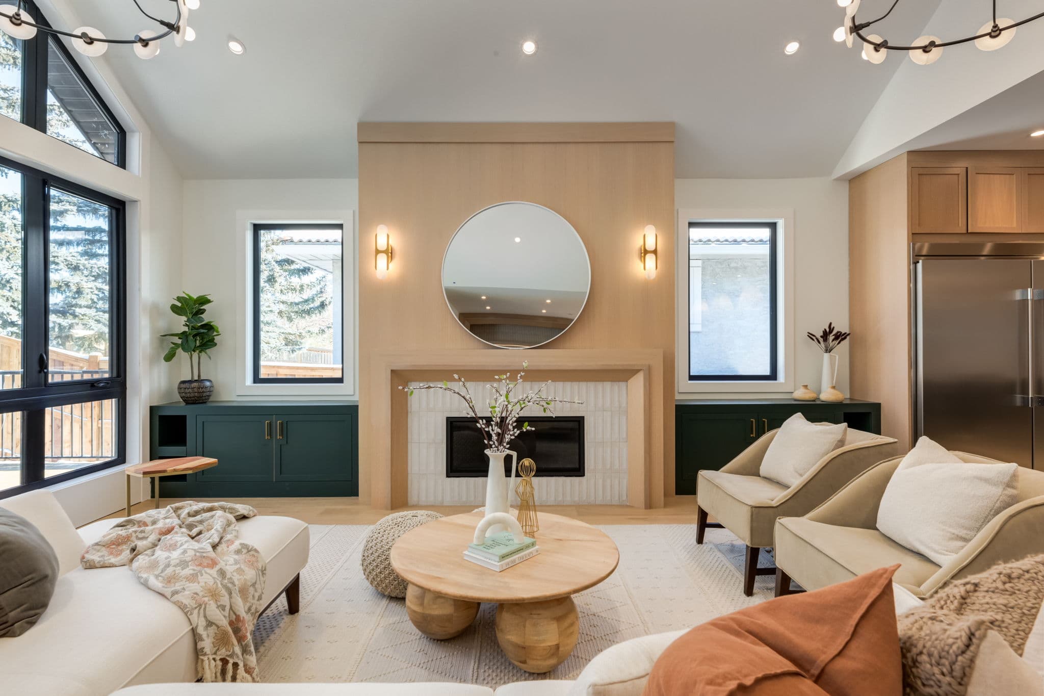Living room fireplace feature in the Varsity 2 project by Platinum Build Homes in Varsity, Calgary.