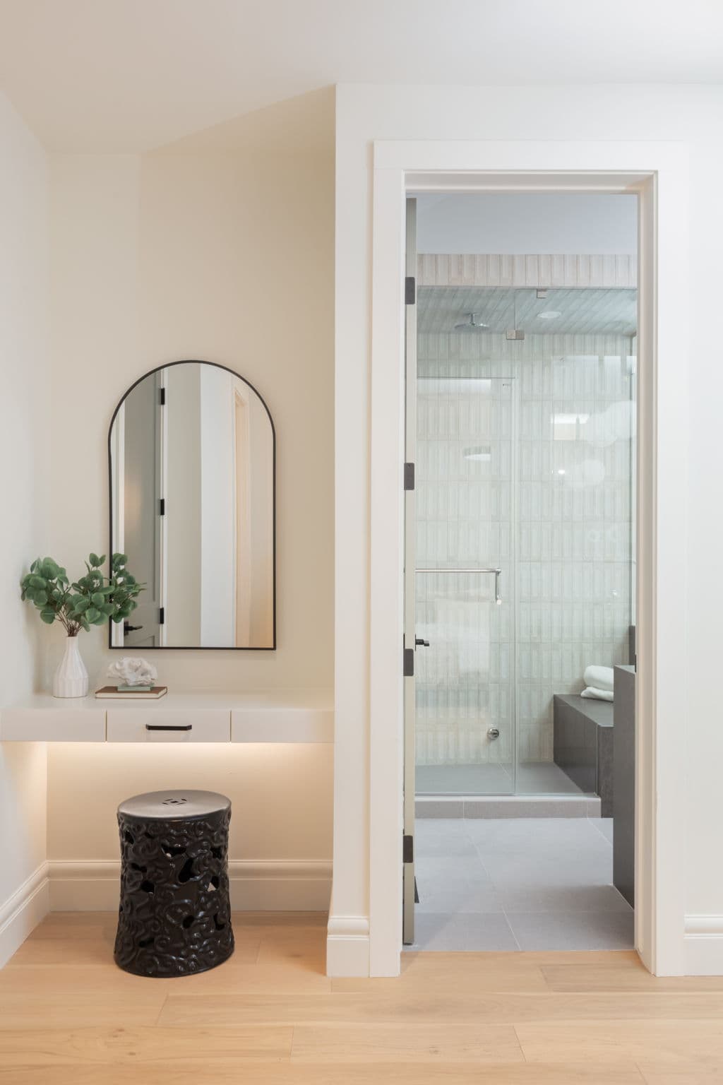 Vanity and bathroom entry detail in the Varsity 2 project by Platinum Build Homes in Varsity, Calgary.