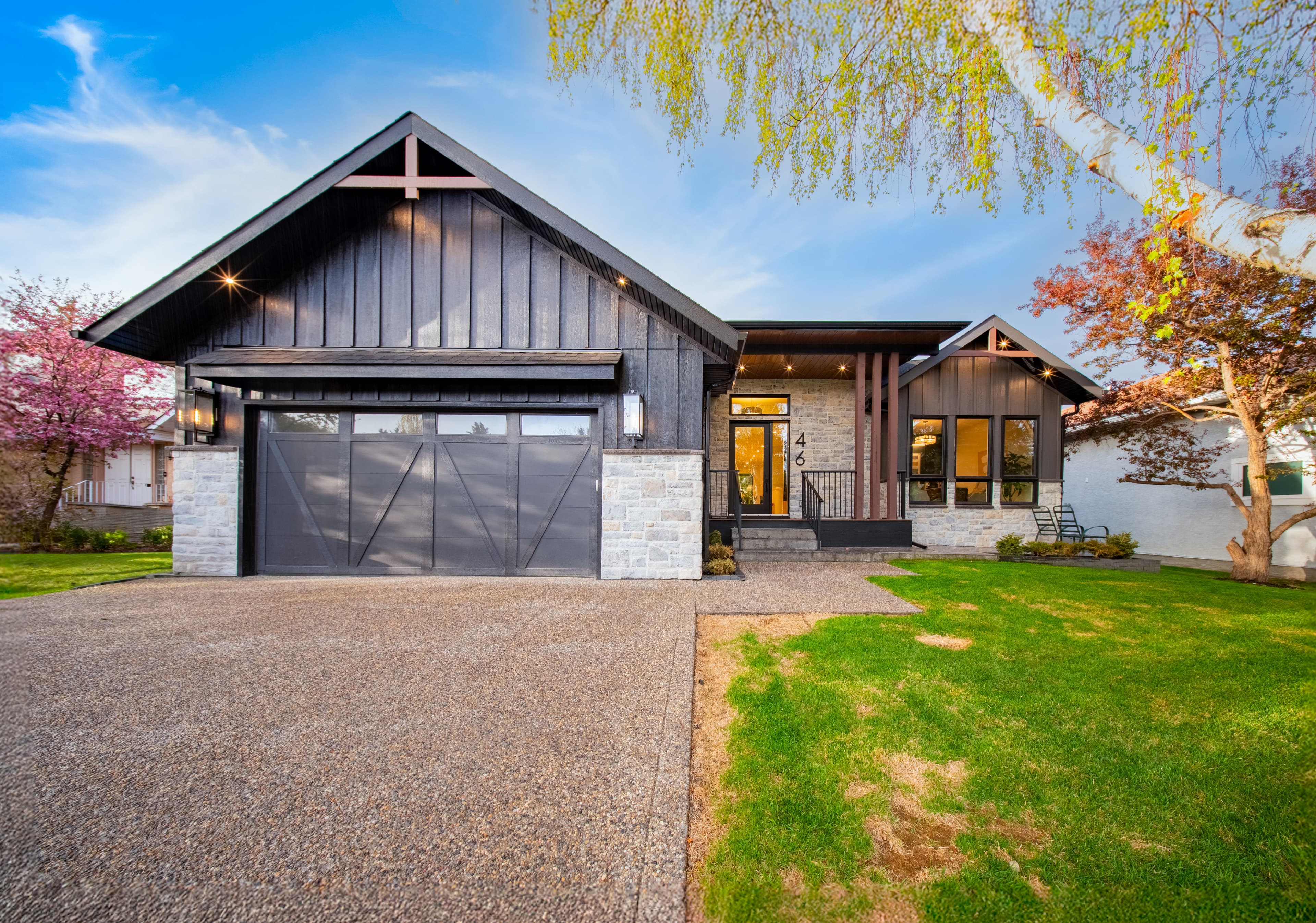 Front exterior of renovated Varsity home in the Varsity 2 project by Platinum Build Homes in Varsity, Calgary.
